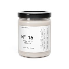 a candle that says no 16 peter smith london happy birthday on the front and side