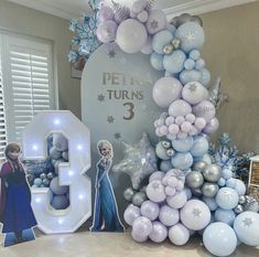 frozen princess birthday decorations and balloons with the number 3