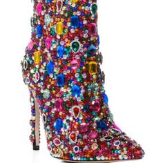 The Azalea Wang " Blinged Totally " Stiletto Rhinestone Cocktail Bootie In Multi Is Made From A Suede Upper And Features Clustered, Multicolor Rhinestone And Gem Detailing, A Mid-Calf Height Shaft, A Pointed Toe Silhouette, And A Coordinating, Multicolor Rhinestone And Gem-Detailed Stiletto Heel. Complete With An Inner Ankle Zipper Closure. - Suede Upper - Pointed Toe - Stiletto Heel - 9.25” Shaft Height - 4.5” Heel Height Elegant Multicolor Rhinestone Heels, Multicolor Rhinestones Heels For Evening, Multicolor Crystal Embellished High Heels, Glamorous Multicolor Rhinestone Heels, Glamorous Multicolor Evening Heels, Multicolor Crystal Embellished Party Heels, Elegant Multicolor Embellished Heels, Multicolor Rhinestone Heels For Night Out, Multicolor Embellished Evening Heels