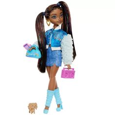 a barbie doll with long hair and blue outfit holding a pink purse while standing next to a brown dog