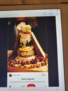 an image of food on the screen of a laptop computer, with caption that reads tarta nupetial