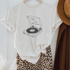 Relaxed Unisex Fit Record Graphic, Cool Shirt Designs, For The Record, Graphic Tee Outfits, Cute Shirt Designs, Leopard Skirt, Shirt Design Inspiration, Cute Graphic Tees, Tee Shirt Designs