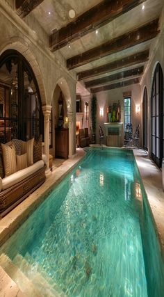 an indoor swimming pool in a large home