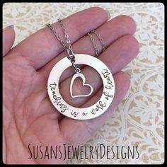 "This necklace is made with stainless steel components hand stamped by myself with your choice of wording as shown in pictures.  Large 1 1/2\"washer has been stamped \"teaching is a work of heart\".   The center hole of the washer has a dangling silver tone open heart charm.   Pendant to be added to your choice of chain. If you'd like different wording stamped on your necklace, please contact me before checkout with your design idea to make sure it will fit. Use the pull down menu to select your Teacher Jewelry, Teachers Necklace, Teacher Custom, Custom Teacher Gifts, Gift For Teacher, Gift Teacher, Appreciation Gifts, Necklace Personalized, Open Heart