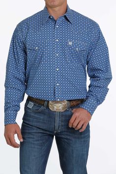 The Cinch Classic Fit features a full body width and extra-long sleeves and tails that provide cowboys with the room and range of motion needed for riding and swinging a rope. Most men can size down from other brands in Cinch Classic shirts. Blue, Black, and White Geometric Long Sleeve Spread Collar Straight Back Yoke 1 Open Pocket Western Button Front 100% Cotton Machine Washable Blue Button-up Shirt For Ranch, Blue Shirt With Pockets For Rodeo, Blue Western Shirt With Button Closure, Blue Western Tops For Rodeo, Blue Tops With Pockets For Ranch, The Cinch, Western Store, Country Men, Cowgirl Western