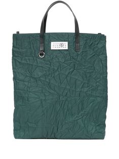 forest green textured finish logo patch to the front ring hardware detailing open top two flat top handles detachable shoulder strap main compartment internal logo patch This piece comes complete with a protective dust bag. Luxury Green Nylon Bag, Green Rectangular Coated Canvas Bag, Functional Green Bags With Double Handle, Green Coated Canvas Tote Bag, Green Functional Bag With Top Carry Handle, Functional Green Bag With Top Carry Handle, Green Functional Double Handle Bags, Functional Green Double Handle Bags, Green Coated Canvas Bag With Top Carry Handle