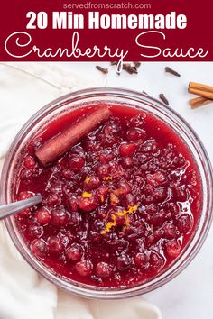 cranberry sauce in a glass bowl with cinnamon sticks and spices on the side