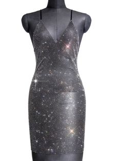 Rhinestone see through sparkling dress. SIZE Bust: 31-43” Waist: 31-39” Length:32” Club-ready Backless Dresses With Rhinestones, Club Backless Dresses With Rhinestones, Backless Club Dresses With Rhinestones, Glamorous Rhinestone Bodycon Dress For Night Out, Bedazzled Dresses For Night Out And Party Season, Bodycon Rhinestone Dress For Party Season, Bodycon Dresses With Rhinestones For Party Season, Sleeveless Bodycon Dress With Rhinestones For Night Out, Glamorous Rhinestone Bodycon Dress For Date Night