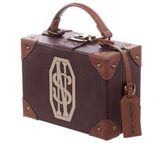 PRICES MAY VARY. Officially Licensed We don’t recommend trying to store any magical beasts in this handbag, but your keys, makeup and other small accessories are fair game. This handbag is designed after Newt Scamander’s own magical briefcase. Newt Scamander Suitcase, Fantastic Beasts Series, Fantastic Beasts Movie, Small Suitcase, Newt Scamander, Harry Potter Collection, Fantastic Beasts And Where, Harry Potter Universal, Newt