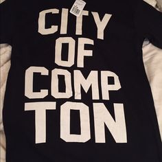 City Of Compton Tee Cool Crew Neck Tops With Text Print, Forever 21 Graphic Tee For Streetwear, Forever 21 Graphic Print Crew Neck T-shirt, Forever 21 Short Sleeve Graphic T-shirt, Forever 21 Graphic Print T-shirt For Streetwear, Forever 21 Letter Print T-shirt For Streetwear, Forever 21 Letter Print Streetwear Top, Forever 21 Graphic Print Tops For Streetwear, Forever 21 Black Crew Neck T-shirt