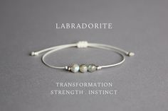 This 6 mm labradorite bracelet (grade AA) is a perfect addition to your look and a great gift idea! MORE LABRADORITE JEWELRY: https://www.etsy.com/shop/YPCrystalJewelry?search_query=labradorite SPACER BEADS SIZE: - Stainless steel in silver color: 2.5mm x 2.5mm - Stainless steel in gold color: 2mm x 1.5mm - 925 sterling silver: 2.5mm x 2.5mm - 24K gold plated sterling silver: 2.5mm x 2.5mm - Rose gold plated brass: 2.5mm x 2.5mm HOW TO MEASURE: Choose your bracelet size by wrapping a string arou Elegant Adjustable Labradorite Beaded Bracelets, Elegant Labradorite Beaded Bracelets, Minimalist Adjustable Gray Jewelry, Adjustable Minimalist Gray Jewelry, Minimalist Gray Adjustable Jewelry, Minimalist Adjustable Labradorite Jewelry, Rhodochrosite Jewelry, Great Grandma Gifts, Labradorite Bracelet