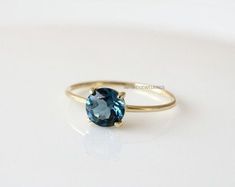 London Blue Topaz Ring Wedding Engagement Romantic Ring Round | Etsy Canada Minimalist Topaz Jewelry For Weddings, Minimalist Solitaire Topaz Ring In Round Cut, Minimalist Solitaire Topaz Ring With Round Cut, Minimalist Round Cut Solitaire Topaz Ring, Minimalist Blue Topaz Solitaire Jewelry, Elegant Solitaire Topaz Ring In 14k White Gold, Elegant Round Blue Topaz Ring, Dainty Round Cut Topaz Promise Ring, Solitaire Topaz Crystal Ring