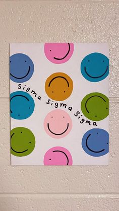 a white wall with a smiley face on it and the words singa sigmasma