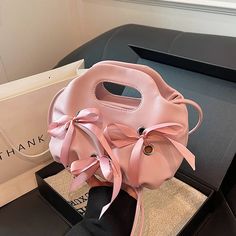 Chic Pink Satin Ribbon Drawstring Pouch Handbag Elegant Pink Pouch Bucket Bag, Pink Pouch Bucket Bag For Evening, Pink Evening Pouch Bucket Bag, Pink Evening Bucket Bag Shaped As Pouch, Chic Pink Bucket Bag For Shopping, Pink Evening Bucket Bag, Chic Pink Bucket Bag For Evening, Chic Pink Bucket Bag For Daily Use, Chic Pink Shoulder Bucket Bag