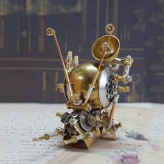 This stunning sculpture is a one-of-a-kind creation that showcases the beauty and intricacy of steampunk design. It is made from clockworks and tiny metal parts that have been carefully assembled to form a realistic and detailed insect shape. The sculpture has a metallic shine and a vintage charm that will appeal to any fan of metal, mechanical or steampunk art. It is a perfect addition to your collection or a unique gift for someone special.  Specifications: Name: Steampunk mosquito Color: As Shown Material: Stainless Steel + Iron + Copper Product Dimensions: 10 x 7 x 7cm Product Weight: 93g Package Dimensions: 14 x 14 x 10cm Package Weight: 340g Packing: Metal Box Please note that this product is a finished product that has been assembled. Attention: Please don't leave children unattende Mechanical Insect, Snail Sculpture, Real Spiders, Metal Model Kits, Small Crafts, The Bug, Insect Art, Steampunk Design, 3d Metal