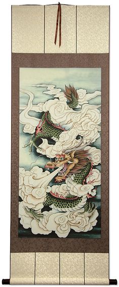 a painting hanging on the wall with two dragon flying over water and clouds in it