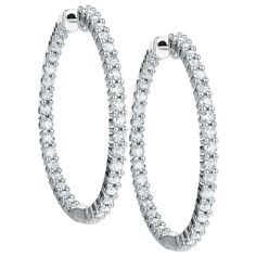 Trendy 7ct Diamond Hoops METAL SPECIFICATIONS Metal Name: White Gold 14K STONE SPECIFICATIONS Stone Name: DIAMOND Stone Cut : Round cut Stone Specifications: There are 35 diamonds approx. 0.10 carats each (approx. dia. 2.9 mm) in each earring. Natural earth mined diamonds. Approx. Age of Diamonds : Over a Billion years old Place of Formation : At depths between 93 to 155 miles in the Earth mantle Total Stone Weight: approx. 7 carats Color: F Clarity: VVS1 EARRING SPECIFCATIONS Height : Approx. 1 Diamond Earrings Studs Round, Bracelet Tennis, Halo Earrings Studs, Diamond Hoop Earrings, Natural Earth, Simple Earrings, Round Earrings, Sparkle Diamonds, Real Diamonds