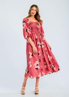 Easy floral midi dress featured in a flowy silhouette with a smocked bodice and volume sleeves. Cotton voile, textured fabrication  Relaxed fit  Side pockets -Contents 70%Cotton 30%Rayon Approximate measurements are as follows Small: Length:48 3/4 " Bust: 29"- 49"  Waist: 28- 48" Medium: Length:49 1/4" Bust:31"-51"    Waist 30- 50"  Large: Length:49 3/4" Bust:33"-53" Waist 32 -52" Spring Beach Floral Dress With Smocked Bodice, Vacation Floral Print Midi Dress, Vacation Midi Dress With Floral Print, Summer Floral Print Mid-length Midi Dress, Floral Print Mid-length Vacation Dresses, Floral Print Mid-length Midi Dress For Summer, Flowy Square Neck Ruched Maxi Dress, Square Neck Floral Dress For Day Out, Flowy Floral Sundress With Smocked Bodice