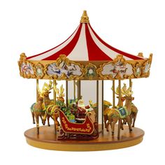 a merry go round with horses and people riding on the top, in front of a white background