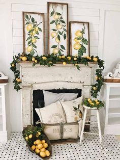 a white fireplace with lemons on the mantle