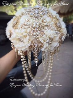 a bridal bouquet with pearls and jewels