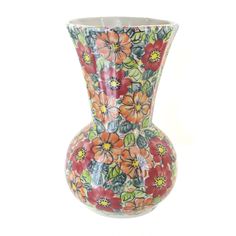 a vase with flowers painted on it is shown in red and green colors, against a white background