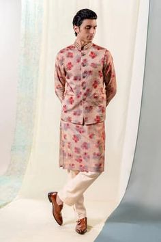 Cinnamon red bundi with an abstract ink blotted floral print and hand embroidery detail over it. - Aza Fashions Spring Festive Bandhgala With Printed Motifs, Festive Spring Bandhgala With Printed Motifs, Floral Print Nehru Jacket For Festive Occasions, Spring Designer Nehru Jacket With Printed Motifs, Spring Nehru Jacket With Printed Motifs For Designer Wear, Spring Nehru Jacket With Printed Motifs, Transitional Printed Nehru Jacket, Transitional Season Printed Nehru Jacket, Transitional Fitted Nehru Jacket With Printed Motifs