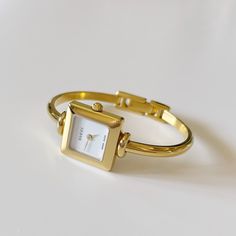 SOLD** Gucci gold plated bangle watch from the 90s Uni Fits, Gucci Watch, Gold Plated Bangles, Watch Fashion, Stylish Watches, The 90s