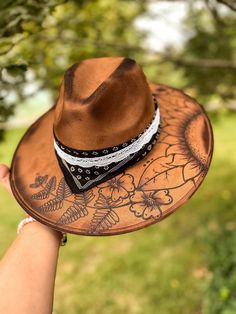 Hand burned wide brim suede fedora. Adjustable headband inside - fits MOST head sizes. Bohemian Felt Hat For Summer, Fitted Bohemian Felt Hat For Summer, Bohemian Fitted Felt Hat For Summer, Bohemian Felt Hat For Festival, Fitted Bohemian Felt Hat For Festival, Summer Bohemian Felt Hat For Western-themed Events, Bohemian Felt Hat For Western-themed Summer Events, Bohemian Felt Hat For Summer Western-themed Events, Bohemian Brown Fedora For Kentucky Derby