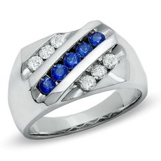 Presenting a remarkable design and unsurpassed brilliance, this 14K white gold men's band is unparalleled with handsome elegance and sweet thoughts of love. Totaling a brilliant 1/2 ct., round diamonds diagonally line the band along with five bright blue sapphires. Sapphire is September's precious birthstone. Heritage Jewellery, Ceylon Sapphire, Sapphire Stone, Size 10 Rings, High Jewelry, Diamond Stone, Fine Silver, Colored Diamonds, Ring Designs