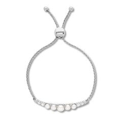 Graduated freshwater cultured pearls fan out on either side of this delightful bolo bracelet for her. Lab-created white sapphires add a splash of shimmer to the bracelet. The sterling silver wheat chain fastens with an bolo clasp that adjusts up to 9 inches in length. Mens Link Bracelet, Mens Diamond Bracelet, Cultured Pearl Bracelet, Bracelet For Her, Bolo Bracelet, Jewelry Advice, Black Sapphire, White Bracelets, Sapphire Bracelet