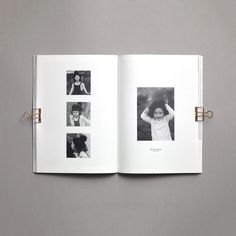 an open book with black and white photos on it