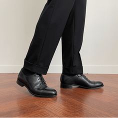 Classic Double-Pleated Suit Pants Black Brand: Oxforder Ideal for formal and business settings, our double-pleated pants effortlessly combine style and functionality. Elevate your wardrobe with these impeccably tailored trousers that ensure a polished and neat appearance. Embrace the timeless charm of double-pleated pants and experience the perfect blend of fashion and comfort. What Are Double-Pleated Pants? Double-pleated pants are a style of trousers with two pleats, or folds, on each side of Classic Ankle-length Dress Pants For Office, Professional Black Pants For Business Casual, Classic Black Business Casual Bottoms, Classic Straight Dress Pants For Work, Classic Black Bottoms For Business Casual, Elegant Semi-formal Ankle-length Dress Pants, Elegant Ankle-length Dress Pants For Semi-formal Occasions, Classic Straight Dress Pants For Office Wear, Black Professional Pants For Formal Occasions