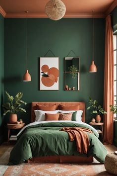 a bedroom with dark green walls and orange bedding in the corner, along with potted plants