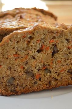 two slices of banana bread sitting on top of a white plate