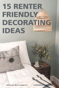 a bed with white sheets and pillows in front of a blue wall that says, 15 renter friendly decorating ideas