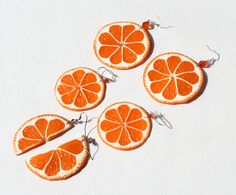 "Orange earrings, fake food jewelry, orange slice earring, citrus jewelry, polymer clay jewelry, orange slice jewelry, funny earrings, Fruit earrings, citrus earrings, half orange slice, food earrings, fruit jewelry Orange earrings I made of polymer clay. A half orange slice and slice of whole orange earrings. The earrings is not afraid of moisture and cold. Orange is realistic - flesh is bright orange color ( the largest orange has a less vibrant flesh than the smaller orange.) . If you look at Jewelry Polymer Clay, Funny Earrings, Orange Slice, Fruit Jewelry, Yellow Jewelry, Food Earrings, Fruit Earrings, Orange Earrings, Online Gift Shop