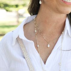 This necklace is all about embracing the timeless allure of a single, lustrous pearl drop, adding that touch of classic elegance. But here's where the fun begins – the delicate chain is perfect for layering with other necklaces, allowing you to create your unique and trendy combinations that will make your outfit pop. With its classic foundation, this necklace effortlessly transitions from everyday casual to a touch of chic for those special moments. It's like that versatile piece that fits ever Elegant Drop Clavicle Chain Necklace, Elegant Drop Shaped Clavicle Chain Necklace, Chic Teardrop Necklace For Gift, Feminine Pearl Drop Necklace, Chic Everyday Pearl Pendant Chain Necklace, Chic Chain Necklace With Pearl Pendant, Everyday Pearl Chain Charm Necklace, Double Strand Pearl Chain Necklace As Gift, Everyday Pearl Charm Necklace With Pearl Chain