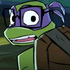 the teenaged turtle is wearing goggles and holding a baseball bat in his hand