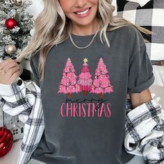 This Pink Christmas t-shirt is a high-quality Comfort Color brand shirt perfect for any occasion during the holiday season. Order in youth sizes Please ask about custom designs-we LOVE creating custom work! ALL OF OUR SHIRTS ARE PRINTED IN HOUSE-WE DO NOT DROP SHIP LIKE THE MAJORITY OF T-SHIRT COMPANIES ON ETSY ◄ HOW TO ORDER► -Select shirt size -Select shirt color -Click "Add to Cart" or "Buy Now" -Complete checkout process ◄ Our Quality Shirts► -Comfort Color Brand -6.1 oz., 100% ringspun cotton ❤️ Follow us on Instagram ❤️ https://www.instagram.com/madebykatieann/ PROCESSING, SHIPPING, & RETURNS -We process orders in 1-10 business days -We ship first class but you may upgrade for faster shipping -Returns not accepted **FAQs** **CUSTOM ORDER -We are happy to customize any product for you T Shirt Company, Christmas Tree Shirt, Pink Christmas Tree, Tree Shirt, Brand Clothing, Drop Ship, Comfort Color, Christmas T Shirt, T Shirt For Women