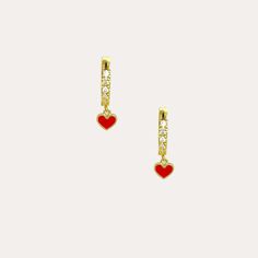 These gold CZ huggie earrings are made with 14k gold vermeil and great for everyday wear. They feature dainty red or white heart enamel charms . They are so cute and sparkly, you will adore wearing them! You may mix and match with other earrings to create your unique ear stack. 14K gold vermeil hoop earring 14K gold-plated heart enamel charms CZ Hoop (size): 12mm Hypoallergenic Sold as a pair Earrings are non returnable due to hygiene reasons. Valentine's Day Yellow Gold Heart Huggie Earrings, Valentine's Day 14k Gold Huggie Earrings, Valentine's Day Yellow Gold Small Hoop Huggie Earrings, Valentine's Day Gold Plated Hoop Earrings With Heart Charm, Valentine's Day Heart-shaped 14k Gold Huggie Earrings, Ear Stack, White Heart, Enamel Charms, Necklace Sizes