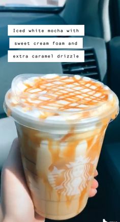 someone holding up a cup of ice cream in their hand with the caption iced white mocha with sweet cream from end extra caramel drizze