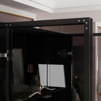 an open black glass door in a room