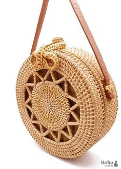 Bohemian round shoulder bag in straw with star decoration This boho shoulder bag is a summer wardrobe must-have when paired with a long flowered dress and sandals. We adore its unique design and starry decoration, which is reminiscent of the 1970s. This bohemian bag in braided straw is worn as a shoulder bag and closes with a lovely buckle. The interior is lined in polyester fabric and has a big compartment for storing personal items. BAG DETAILS Type of bag: shoulder bag Size: 20 cm diameter an Spring Bohemian Straw Bag With Adjustable Strap, Trendy Summer Rattan Straw Bag, Summer Bohemian Bag With Adjustable Strap, Bohemian Summer Shoulder Bag With Adjustable Strap, Bohemian Shoulder Bag With Adjustable Strap For Summer, Bohemian Woven Shoulder Bag For Summer, Spring Rattan Bag With Adjustable Strap, Summer Natural Shoulder Bag With Adjustable Strap, Bohemian Straw Shoulder Bag For Summer