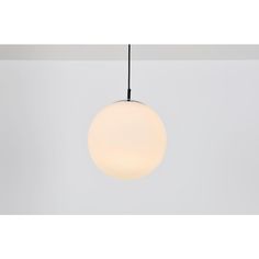 a white light hanging from a ceiling in a room