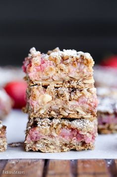 strawberry crumb bars stacked on top of each other