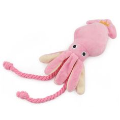 an octopus stuffed animal with a crown on it's head and pink rope around its neck