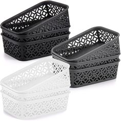 three black and white baskets sitting next to each other