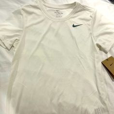 Nwt White Unisex Nike Dry Fit Sports Tee. Perfect For Tennis. Basic White Go-dry Tops, Nike White Sports Top, Nike Go-dry Tops For Light Sports, Nike White Tops For Light Sports, Nike White Top For Light Sports, Nike White Tops For Gym, White Nike Top For Light Sports, White Nike Tops For Gym, White Go-dry Athleisure T-shirt