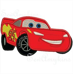 a red car with lightning bolt on it's side and the number 9 in the middle